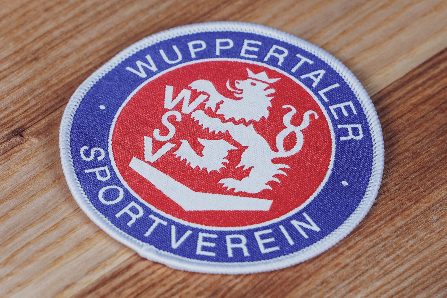 Gewebtes Logo